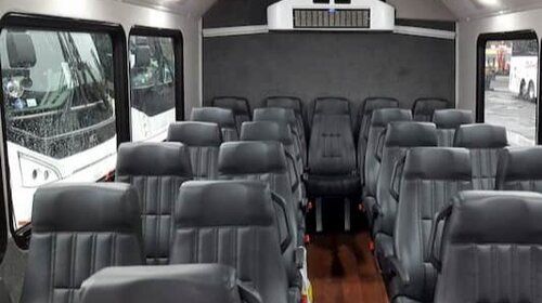 20 passenger minibus interior with gray leather seating