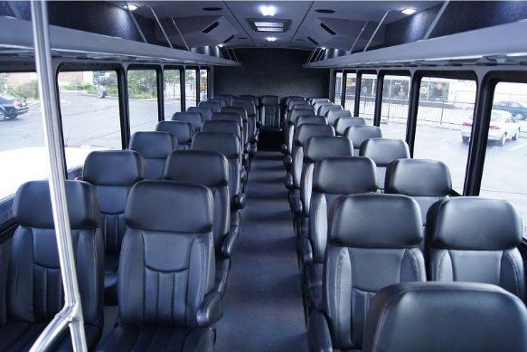 40 passenger shuttle bus interior with forward-facing leather seats