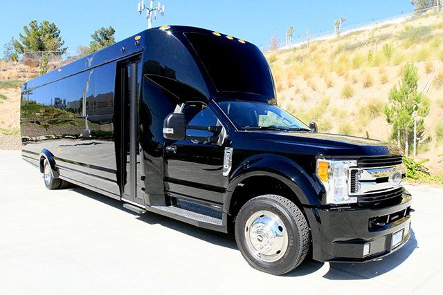 Ford F550 shuttle bus exterior, black executive shuttle front view