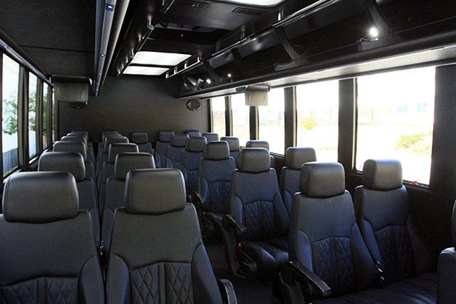 Ford F550 shuttle bus interior with leather perimeter seating