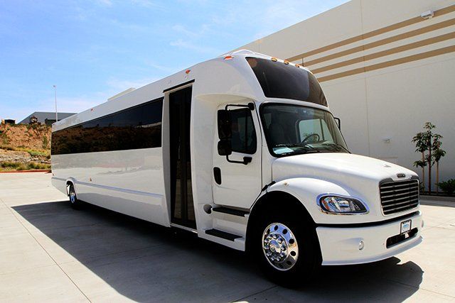 Freightliner shuttle bus exterior, white 40 passenger shuttle