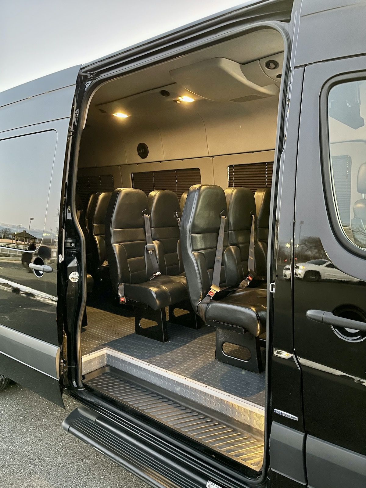 Mercedes Sprinter interior with captain chairs and open entry