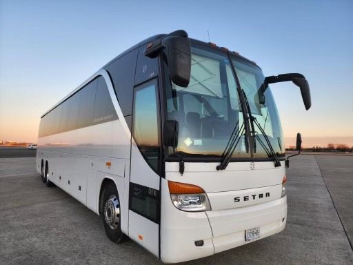 Setra charter bus exterior, white motorcoach